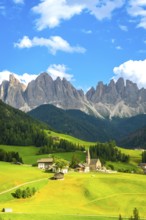 Scenic summer view of st. Magdalena church in val di funes with the odle mountain range in the