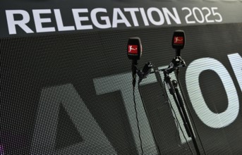 Microphones, microphones, logo, relegation lettering, 2025 Bundesliga, Voith-Arena, Heidenheim,