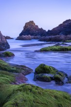 Rocks in Kynance Cove. Evening, blue hour. Long exposure. Kynance Cove, Lizard Peninsula, Cornwall,