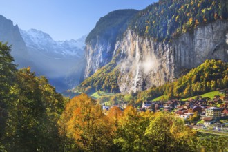 View of town and valley with Staubbach waterfall in autumn, Lauterbrunnen, Bernese Oberland, Canton