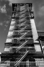 High-rise building with fire escapes Downtown, New York City, USA