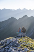 Hiker enjoying the mountain panorama in the morning, Venedigergruppe, Hohe Tauern, Austria