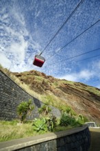 Cable car, Teleférico do Garajau, to the beach of Garajau, Ponta do Garajau stone beach, bathing