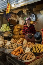 Vendor selling potatoes, stall, Osh Bazaar, Bishkek, Kyrgyzstan