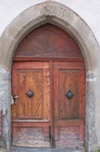 View of an old double wooden door, St. Lorenzen, Bolzano, Trentino, South Tyrol, Italy
