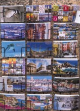Colourful postcards on a stand, old town, Genoa