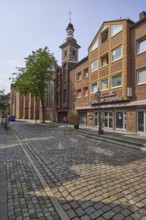 Pizzeria Pulcinella and Kreuzherrenkirche on Ratinger Straße in the historic centre of Düsseldorf,
