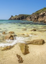 Sandy beach beach and rocks in Nanjizal Bay or Nanjizal Beach. St Just, Penzance, Cornwall,