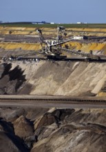 Opencast lignite mine with spreader and motorway in the background, Garzweiler, Jüchen, North