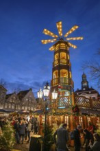 Large Christmas pyramid at the Christmas market on the market square, Lüneburg, Lower Saxony,