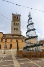 Parish church of San Miguel in Villalón de Campos decorated with a Christmas tree. Valladolid