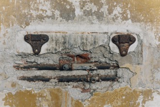 Exposed rusty water pipes, abandoned Swift factory, The Swift refrigerator in Puerto San Julián,