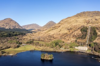 Aerial view, hydro-electric power station at Inveruglas, wooden pyramid viewing point on peninsula,