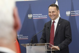 Polish Foreign Minister Radoslaw Sikorski at a joint press conference with his German counterpart,