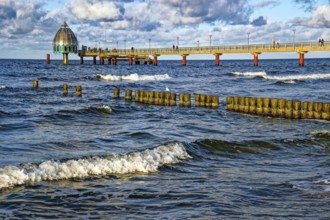 Diving gondola at the Zingst pier, cloudy mood and waves, Baltic Sea coast, Zingst,