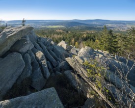 View from the Kösseine over the forests of the Fichtelgebirge, sea of boulders on the summit,