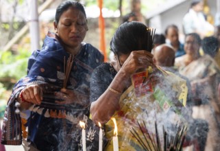 Devotees pray to Lord Buddha on the occasion of Buddha Purnima or Vesak Day that commemorates