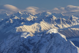 Mountain peak in the evening light with foehn clouds, winter, view from Zugspitze to Stubai Alps,