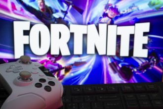 Dhaka, Bangladesh- 12 June 2025: Gaming setup with a controller and keyboard in front of a Fortnite