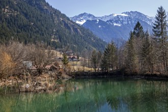 Small lake near Hinterstein, behind mountains of the Allgäu Alps, Bad Hindelang, Oberallgäu,