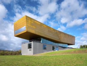 Nebra Ark on a green meadow with a cloudy sky, Museum of the Sky Disc, Visitor Centre, Nebra,