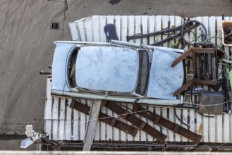 Metals are stored in a scrapyard in the harbour: scrap metal is a valuable raw material for