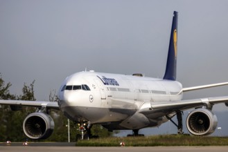 Aircraft at Fraport Airport shortly after landing, Airbus A340-600 of the airline Lufthansa.