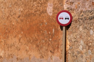 Traffic sign Overtaking prohibited, Overtaking prohibited, on a house wall, ochre-coloured, Alaró,