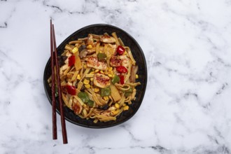 Fried noodles with chicken meat and vegetables, Bami Goreng, Indonesian dish, no people