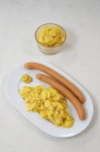 Swabian cuisine, potato salad with string sausages, Wienerle, Wiener sausages, thin boiled sausage,