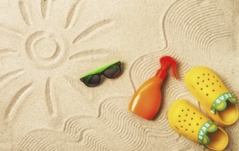 Drawing on the sand, sun and waves, sunglasses, with an orange bottle, yellow rubber slippers, sun