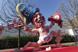 Elon Musk with Napoleon hat, wearing nappy trousers with AfD logo, papier-mâché figure, themed