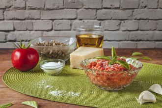 Food photography, making tomato pesto, with tomatoes (Solanum lycopersicum), salt, sunflower