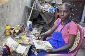 Young artist in a gallery, Brazzaville, Republic of Congo