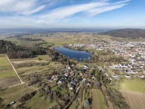 Aerial view of the municipality of Steißlingen with the natural bathing lake Steißlinger See,
