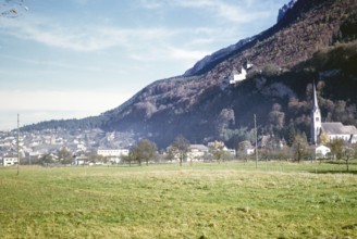 Vaduz Castle and St. Florin Cathedral, Vaduz, capital city of Liechtenstein, Europe 1960