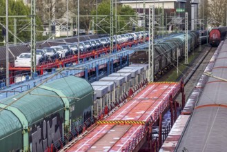 Sindelfingen railway station. Goods trains parked on the tracks. Automotive RailNet. Car transport