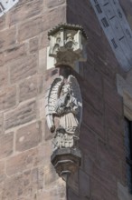 Angel figure, a house figure on the medieval residential tower, the Nassauer Haus, Lorenz Platz,