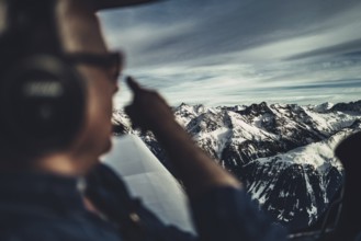 Flight over the late winter Lech Valley with a small aeroplane in Tyrol, Austria