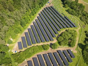 Aerial view of solar panels on an area at the edge of a forest, construction of the Black Forest