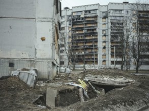 Trench and destroyed residential building in Saltivka, Kharkiv, Ukraine