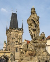 Statue of Vitus with Malá Strana Bridge Tower, Charles Bridge, Prague - Praha, Czech Republic
