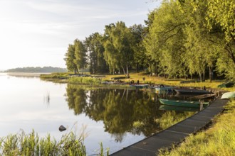 Rowing boats moored at the old lido of the Quitzdorf dam, Upper Lusatia, Saxony, Germany