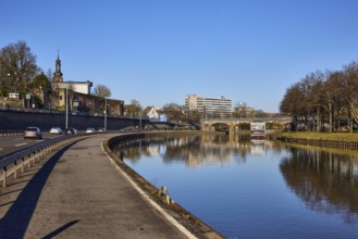 River Saar, footpath and cycle path, river bank, general architecture, church tower, reflections on