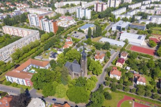 Aerial view of the New Church, in the background the grammar school and the new development area