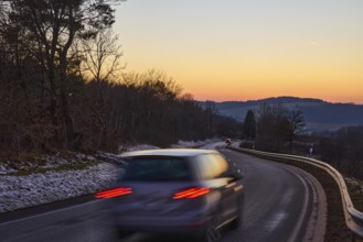Country road, crash barrier, delineator, car, vehicle, brake light, reflector, motion blur, light