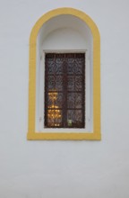 Mountain village Lakkoi with Agios Antonios church, church window, Crete, Greece