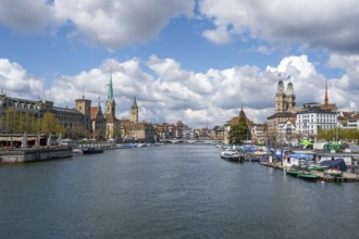 View from the Quaibrücke bridge over the Limmat river to the towers of the old town of Zurich, city