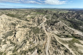 Gravel road Ruta Jubierre, desert, rock formations, aerial view, Desierto de los Monegros, Spain