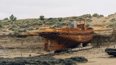 Abandoned supply boat, abandoned Swift factory, The Swift refrigerator in Puerto San Julián, Puerto